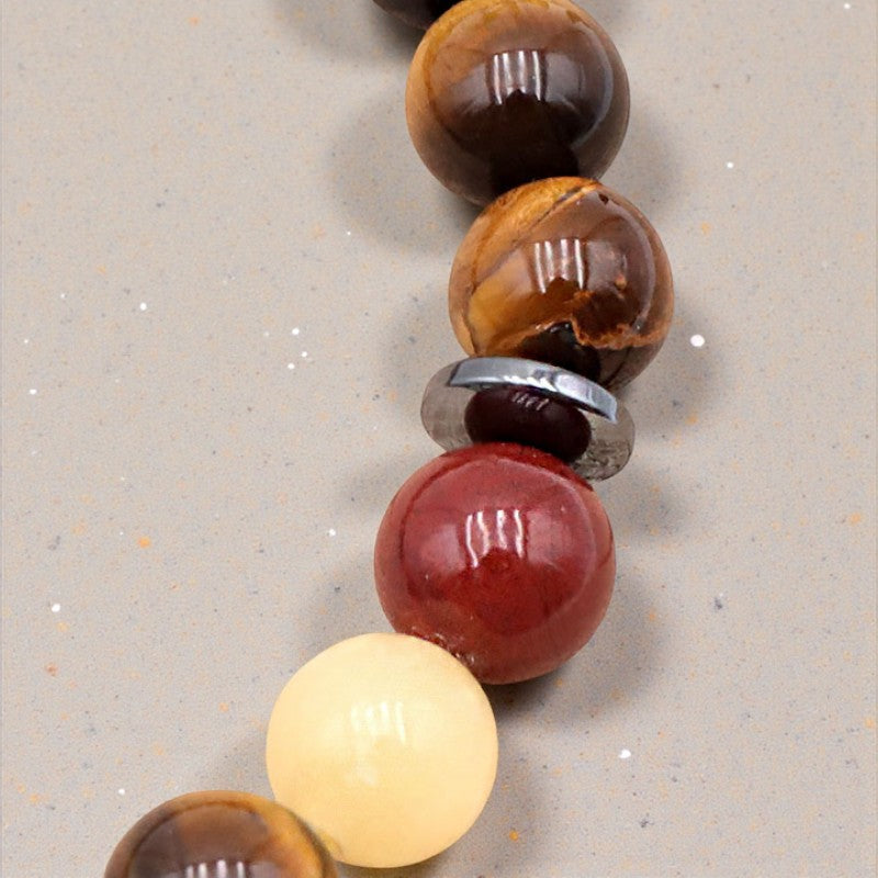 Détail des perles 7 chakras et œil de tigre en pierre naturelle 8 mm