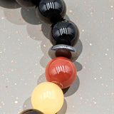 Bracelet 7 Chakras en pierre naturelle – perles boules 8 mm & Onyx noir