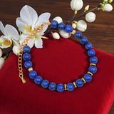Bracelet Lapis Lazuli AURA® – perles 6 mm en pierre naturelle & dorée