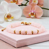 Bracelet Quartz rose AURA® – perles 6 mm en pierre naturelle & dorée