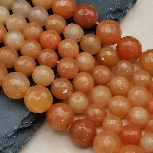Fil de perles d'aventurine orange facettées — La Pierre FR