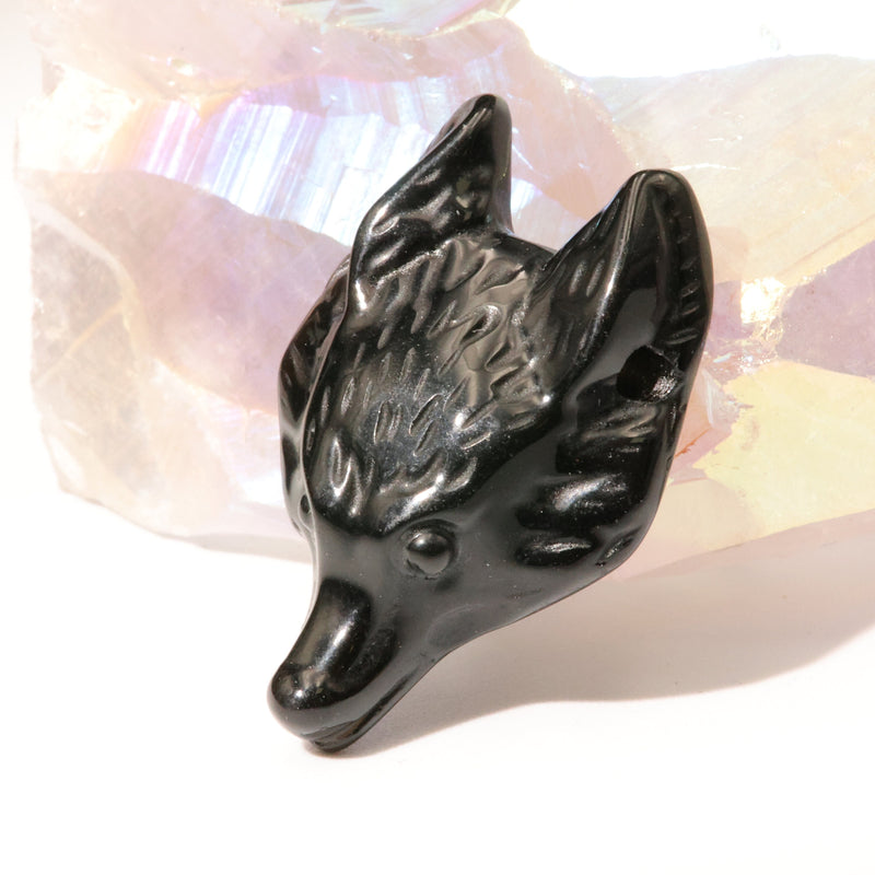 Profil du pendentif tête de loup en onyx, 13 mm d'épaisseur