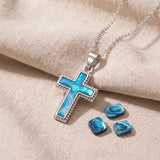 Collier Croix Dentelée en Nacre Naturelle Bleue