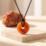 Pendentif Donut Cornaline de 3 cm, Cordon Noir Ciré 50 ou 60 cm