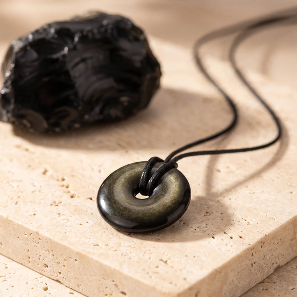 Pendentif donut en obsidienne dorée aux reflets or, idée cadeau bijou en pierre naturelle