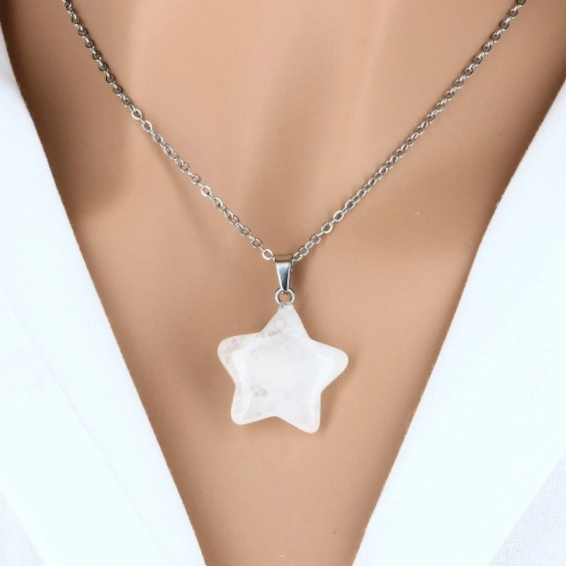 bijou étoile en cristal de roche taillé pierre claire naturelle