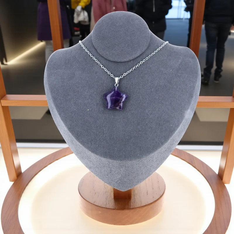 bijou étoile en améthyste taillée pierre violette lumineuse