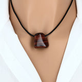 Pendentif pierre Œil de Taureau (roulée & percée)