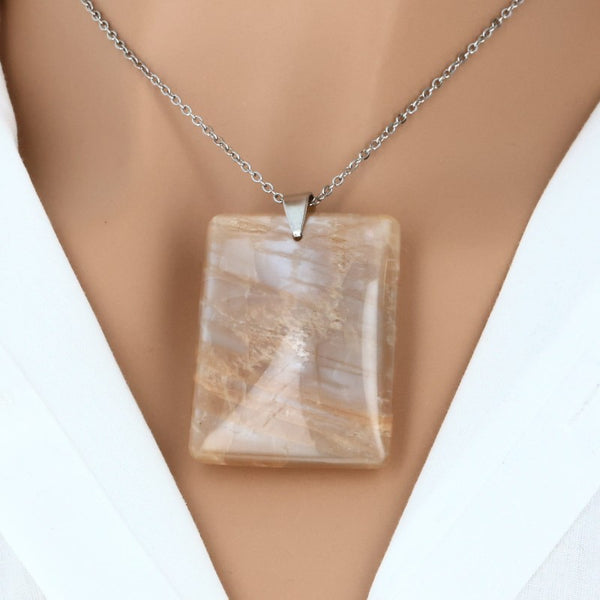 pendentif pierre plate pierre de lune orange nuances chaudes