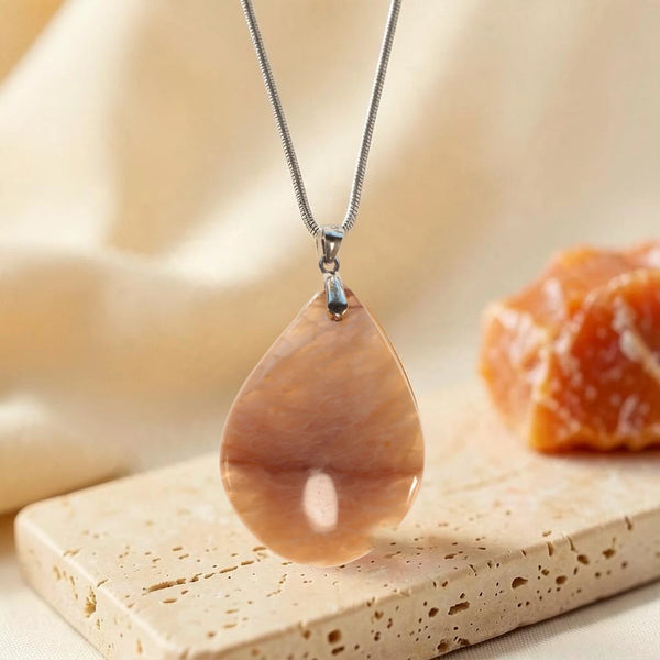 Pendentif pierre orange en pierre de lune orange pièce unique, goutte pêche sur chaîne argentée et travertin