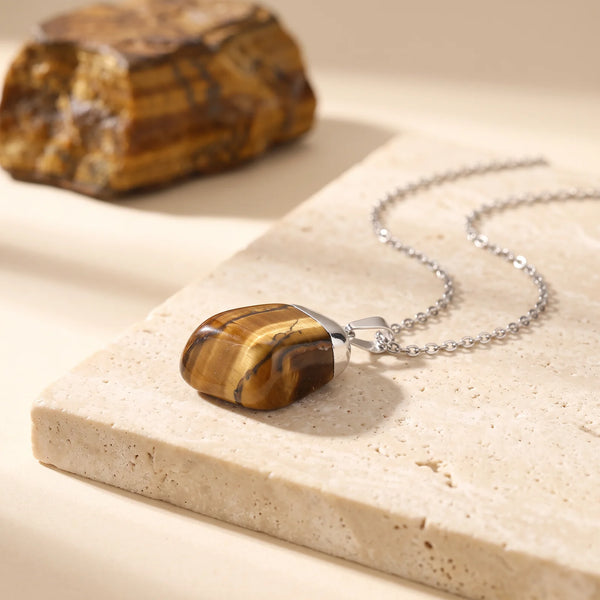 Pendentif œil de tigre roulé aux reflets dorés, bijou de lithothérapie en pierre naturelle