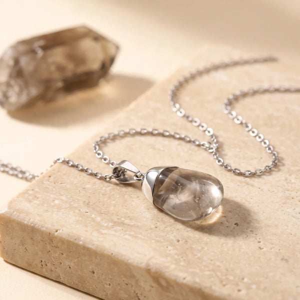 Pendentif quartz fumé roulé, pierre véritable translucide sur bélière argentée