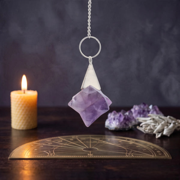 Pendule Merkaba en améthyste, symbole de géométrie sacrée pour l'ésotérisme et la méditation