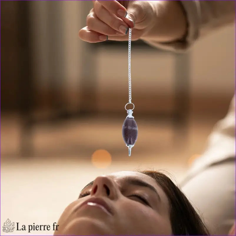 Pendule (Shiva Lingam) pierre sacrée ovoïde naturelle tenue pour radiesthésie - La Pierre Fr