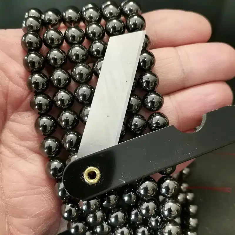 Perle intercalaire en hématite aimantée de 4 mm entre grosses perles