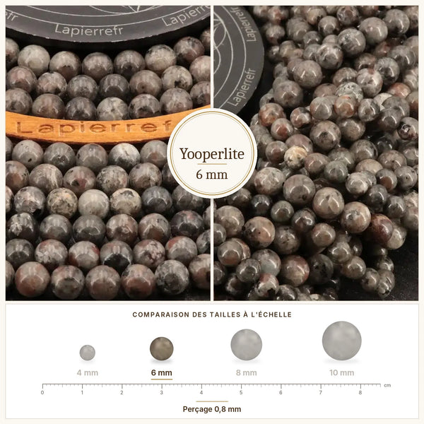 Perles grises à points orange sous UV en yooperlite 6 mm