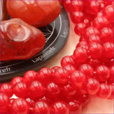 Perle pierre naturelle cornaline rouge ronde en 4/6/8/10mm pour fabrication de bijoux et lithothérapie - La Pierre Fr 