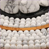 perle pierre naturelle Howlite blanche ronde en 4/6/8/10mm pour la création de bijoux et lithothérapie - La Pierre Fr