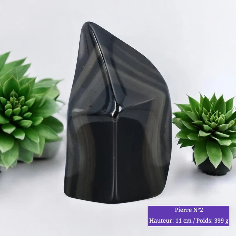 Détail de l'Obsidienne Œil Céleste en forme flamme, pierre naturelle noire mouchetée