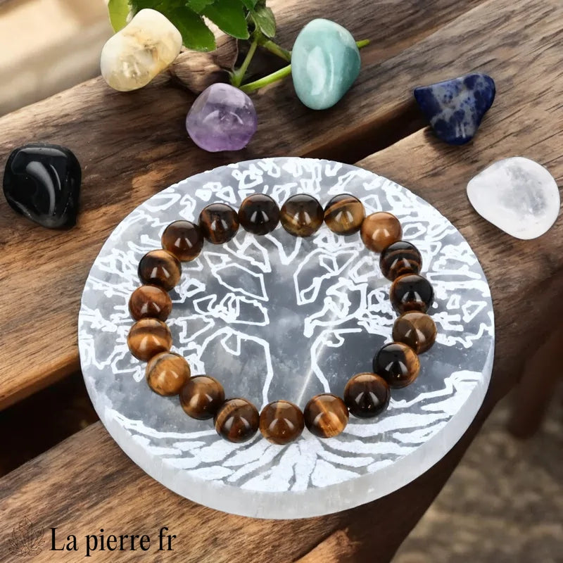 Vue de la plaque de rechargement en sélénite gravée Arbre de Vie, pour purifier vos pierres