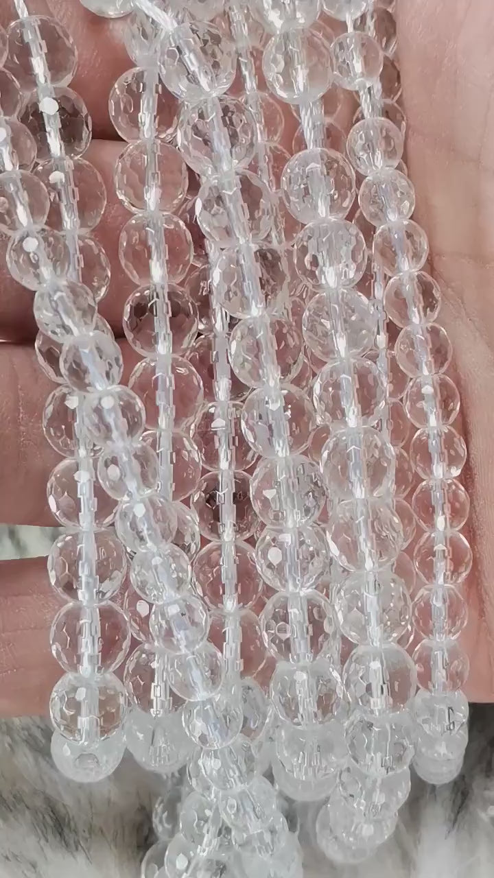 Vidéo des perles de cristal de roche facettées sur fil de 34 cm