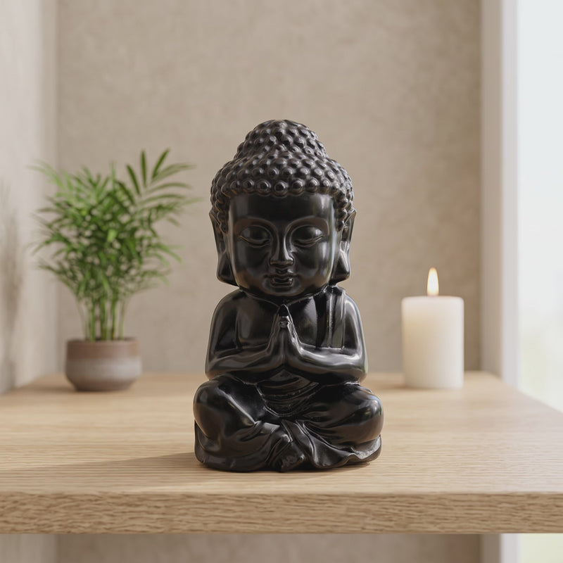 Statue Bouddha en obsidienne dans une décoration zen