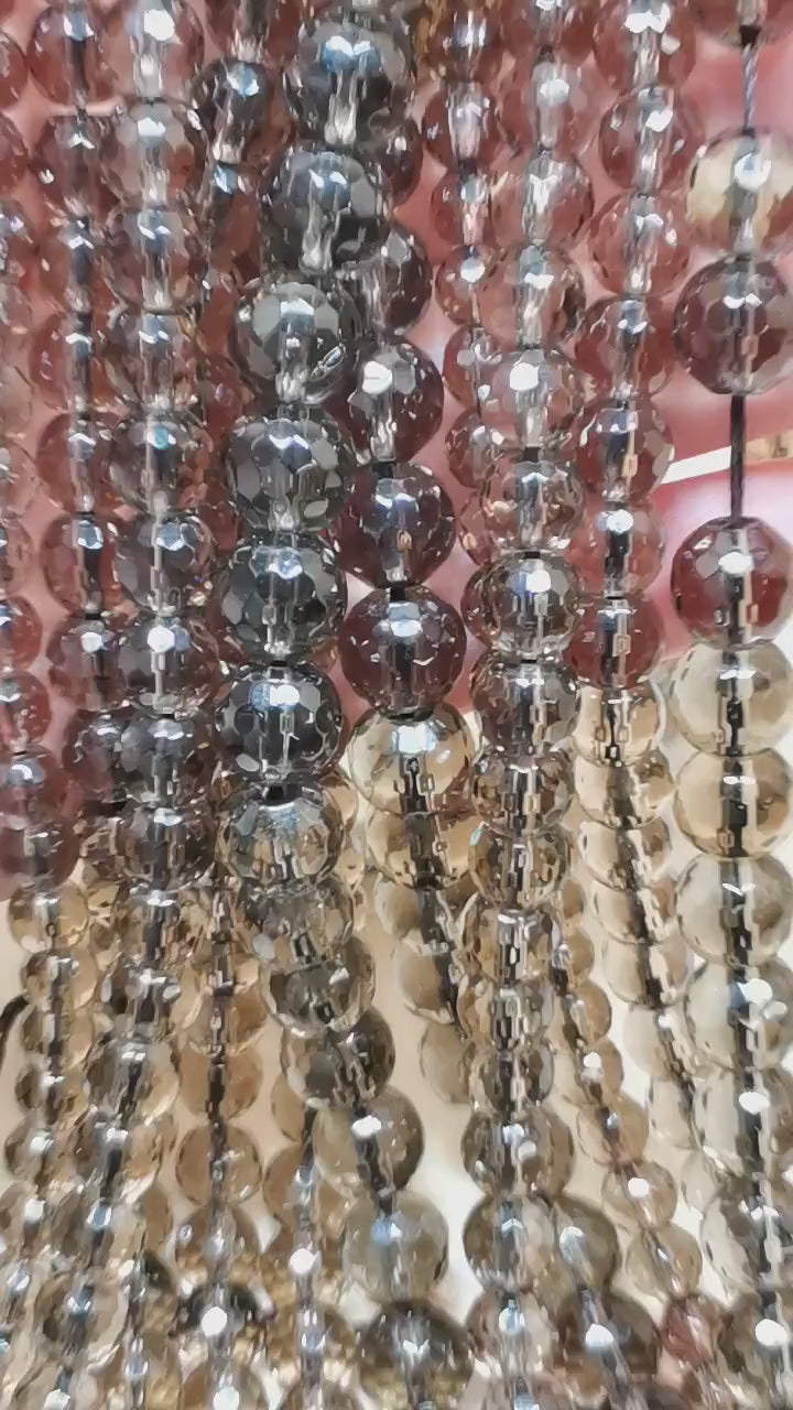 Vidéo des perles de quartz fumé facettées sur fil de 36 cm