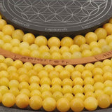 Perle pierre naturelle calcédoine jaune en 4/6/8/10mm pour la fabrication de bijoux et lithothérapie - La Pierre FR