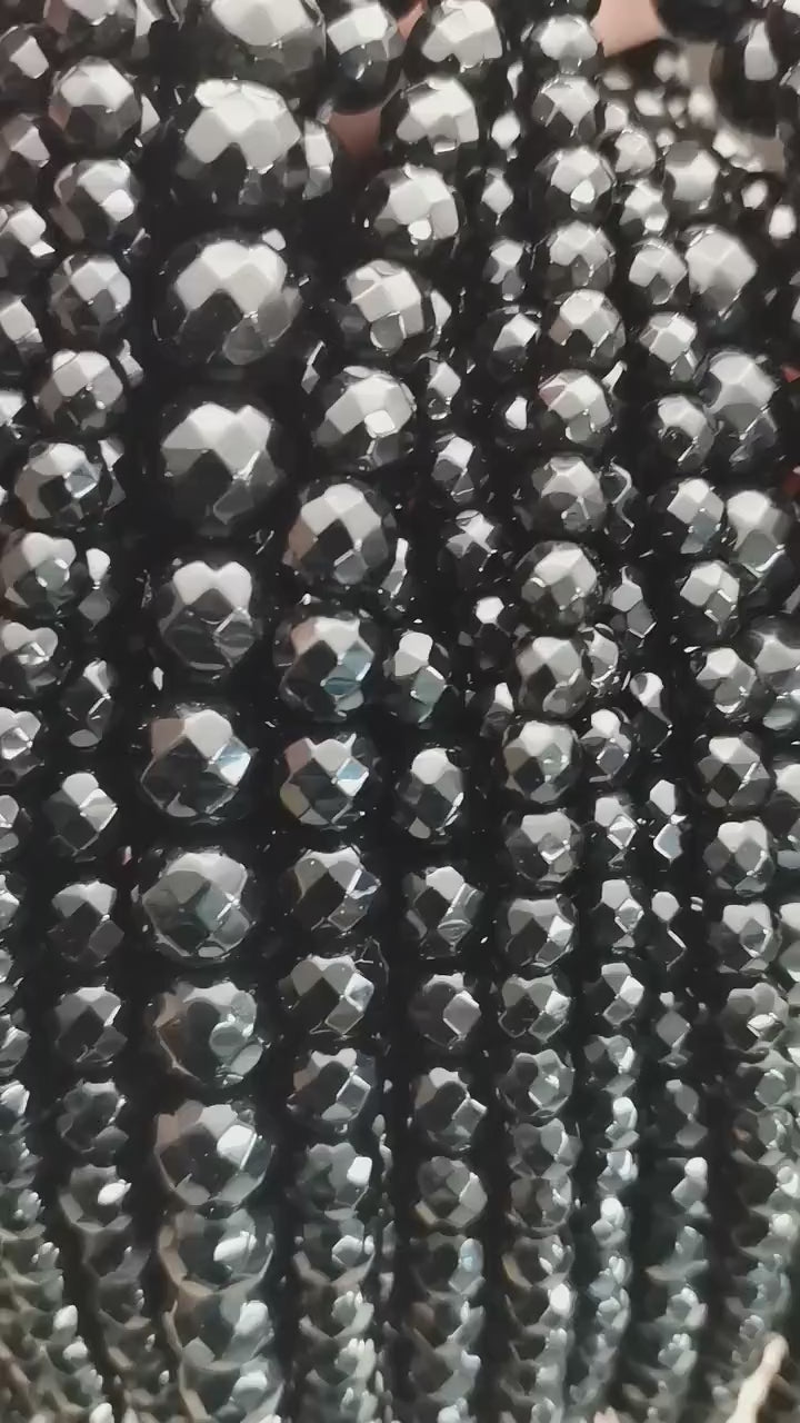 Vidéo des perles d'onyx noir facettées sur fil de 36 cm