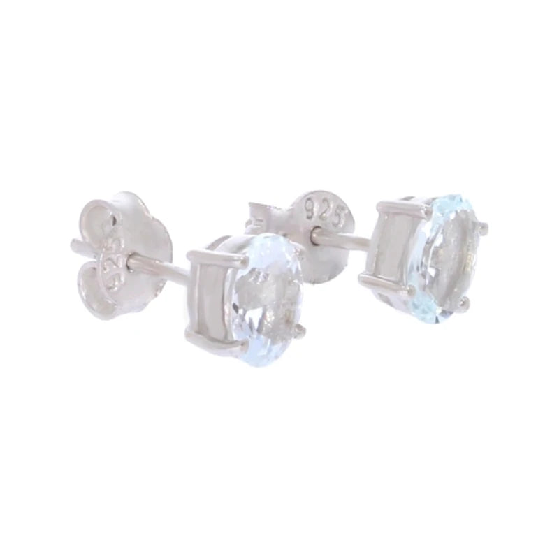 Paire de boucles d'oreilles aigue-marine Seginus sur fond blanc, argent 925 rhodié