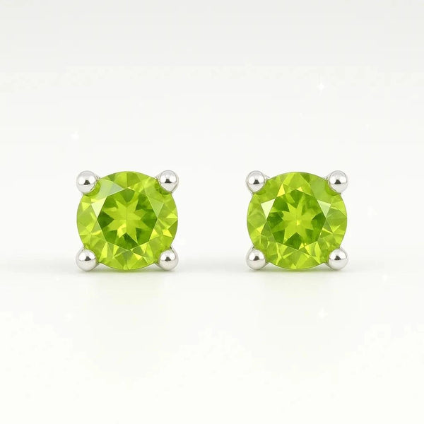 Boucles d'oreilles Propus en péridot et argent 925 rhodié, présentées sur un support