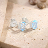 Clous d'Oreilles Topaze Bleue Ovale Facettée 7 x 5 mm, Argent 925 (Vindemiatrix)
